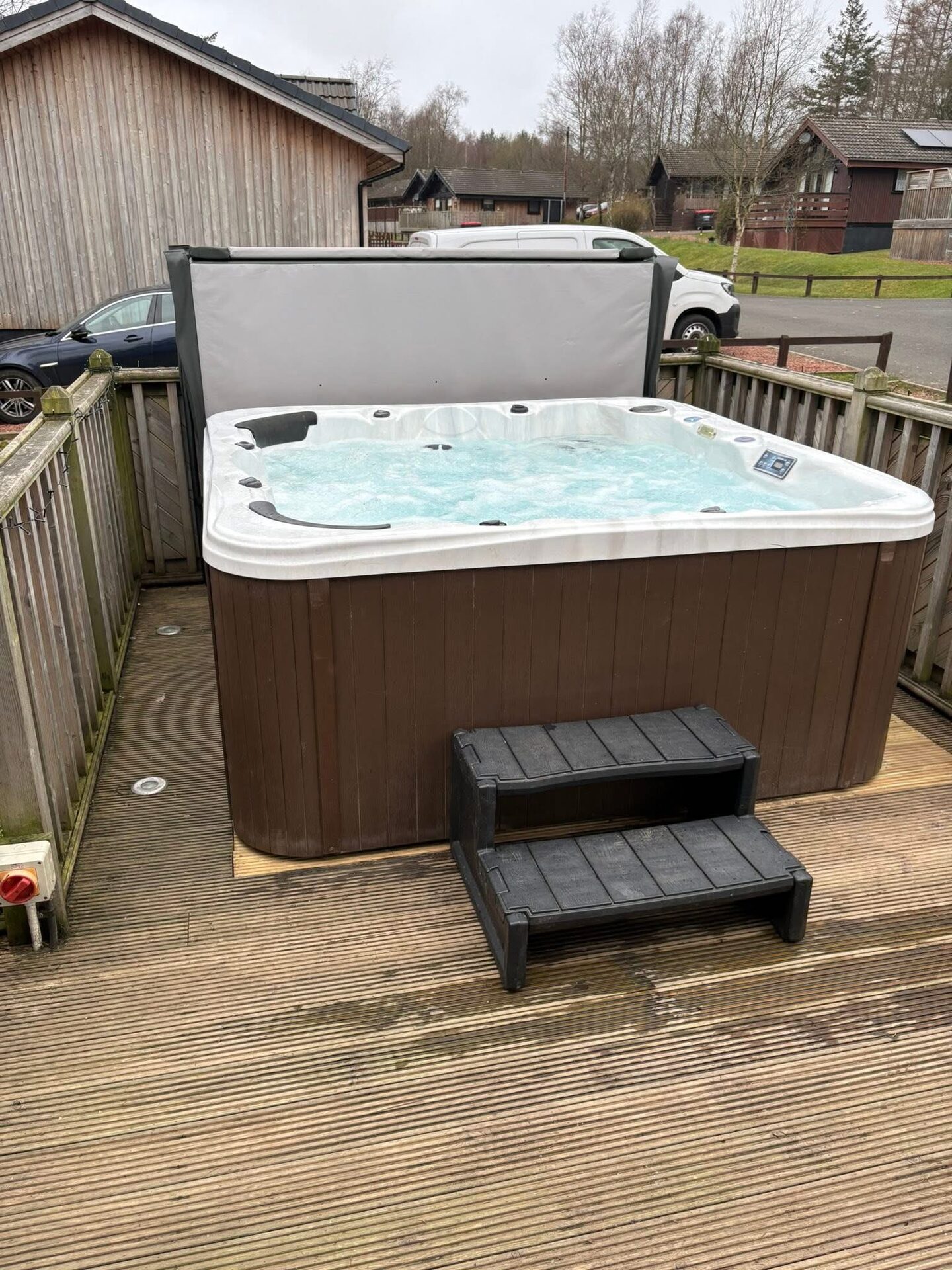 Private hot tub on the lodge decking